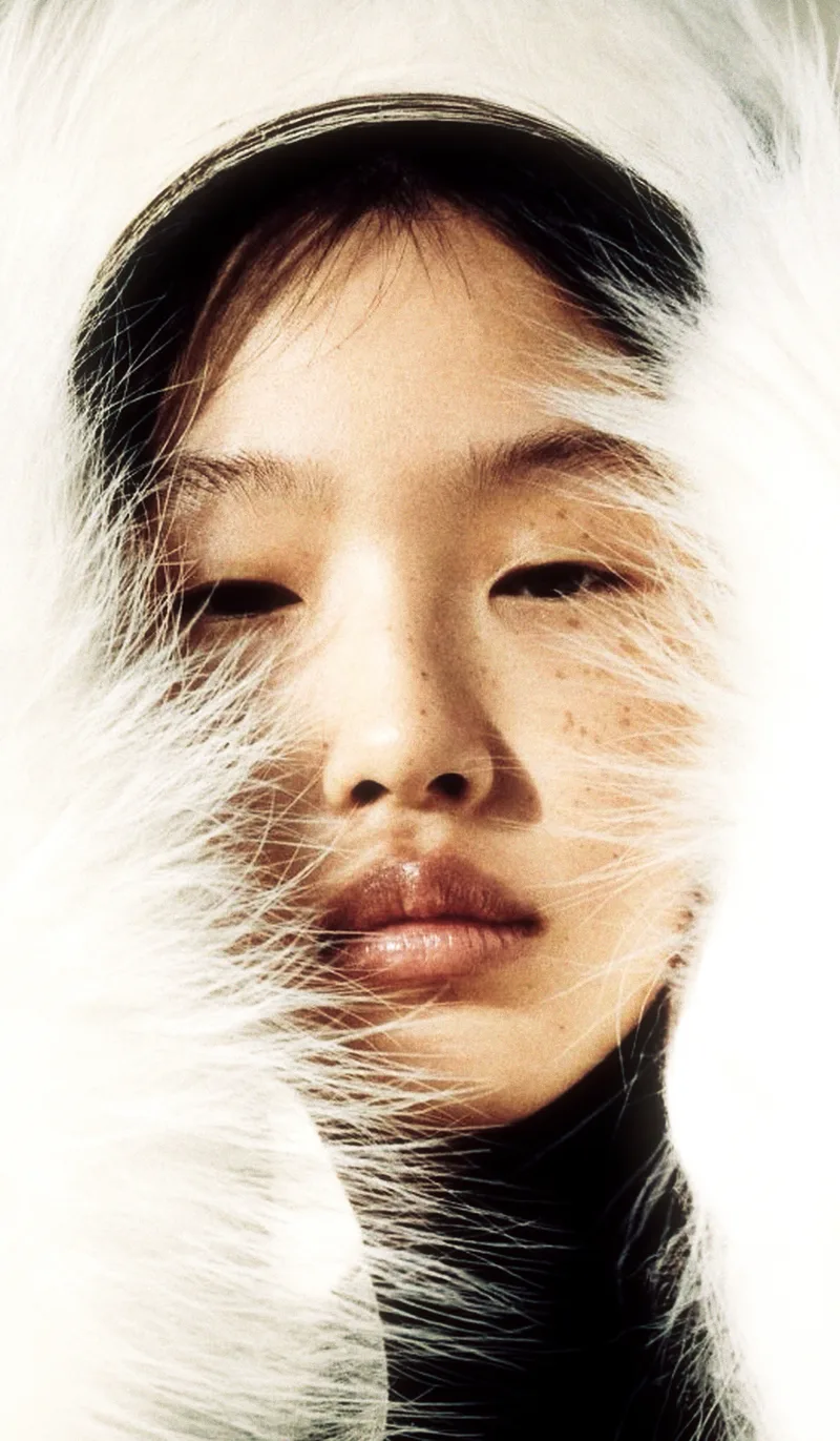 A portrait in a fur hood, on Cashmere Gold
